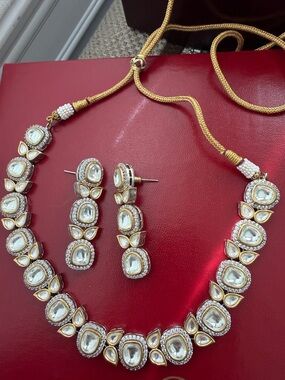 Elegant Gold and White Kundan Necklace Set with Matching Earrings